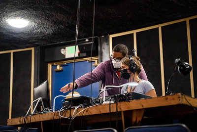 multimedia students using a sound mixer